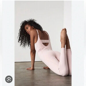 Free People Movement Touch The Sky Onesie in Pink Salt bodysuit Women’s Large